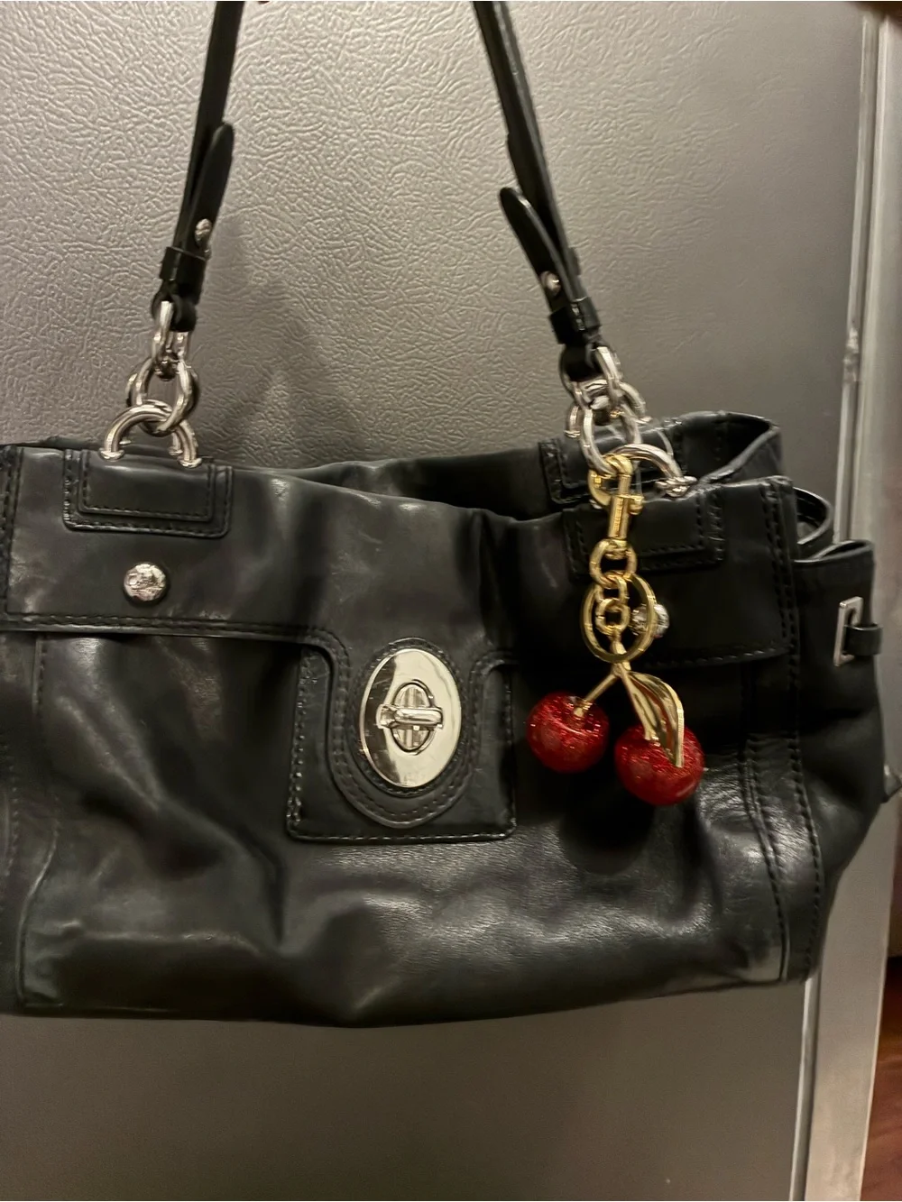 Coach Black Leather Shoulder Bag with Red Cherry Charm